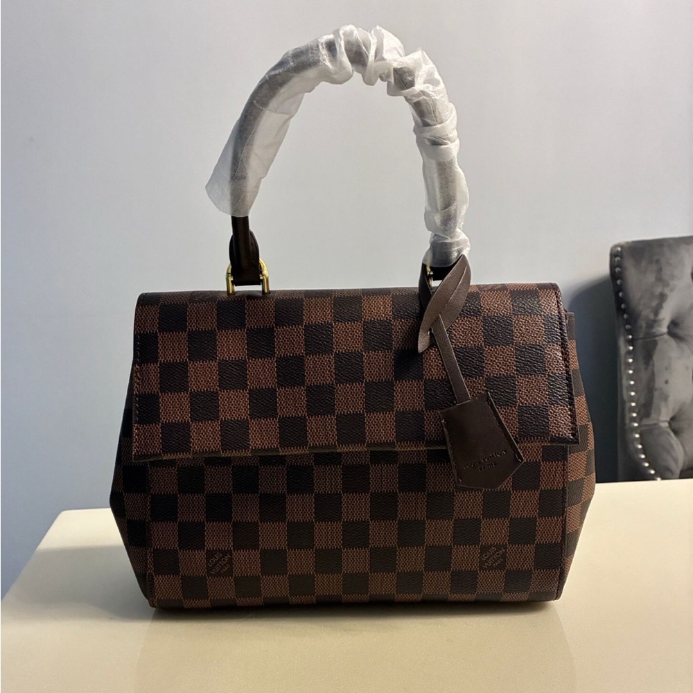 Cute brown purse good quality with red on the inside